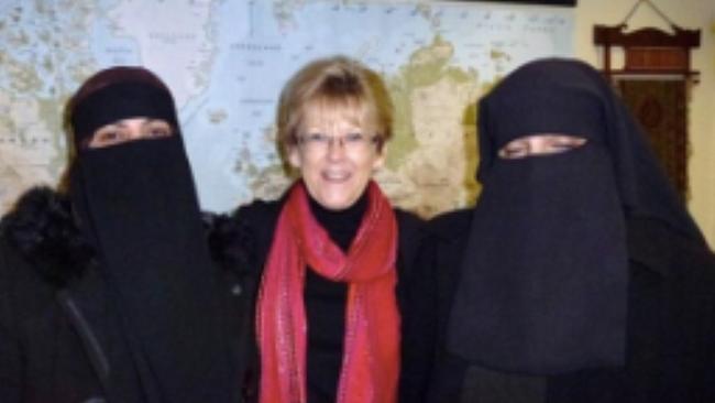 Santa Sabina former head of religion Helen Smith with two speakers pictured in Bradford, England, in 2012.