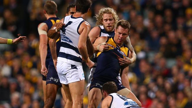 Geelong players remonstrate with Sam Mitchell after he struck Joel Selwood. Picture: Getty Images