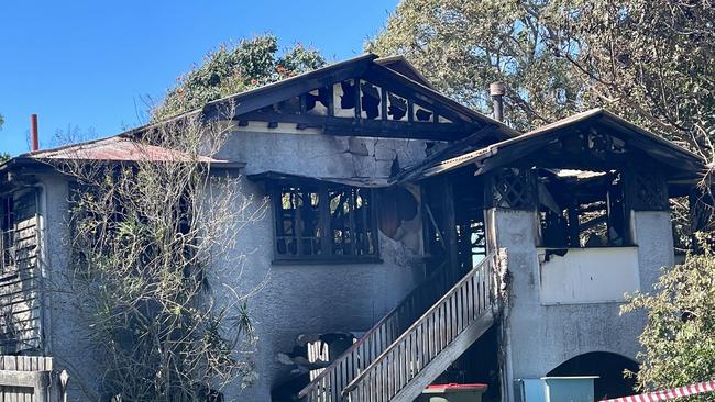 Police have declared a crime scene where fire gutted a two-storey home on Grant St, East Mackay. Picture: Janessa Ekert