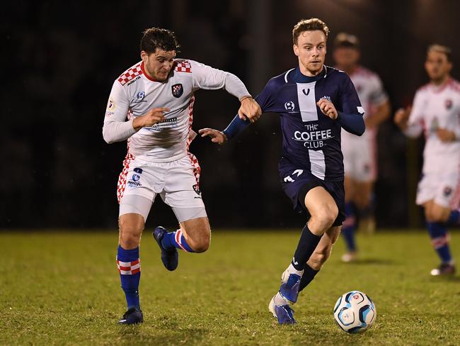 Roman Hofmann and Costa Psaros battle for possession. Picture: Albert Perez/Getty Images