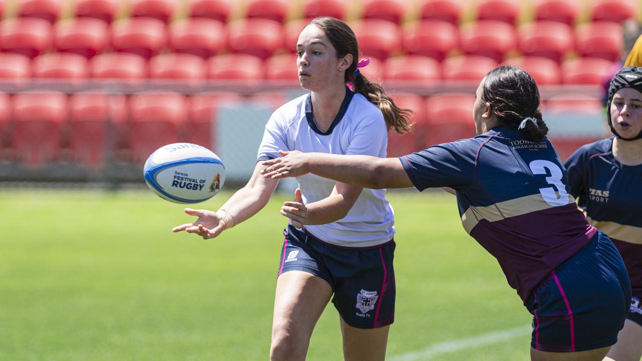 Roma player Madison Bain passes in a club game as Downs Rugby host Next Gen 7s at Toowoomba Sports Ground, Saturday, October 12, 2024. Picture: Kevin Farmer