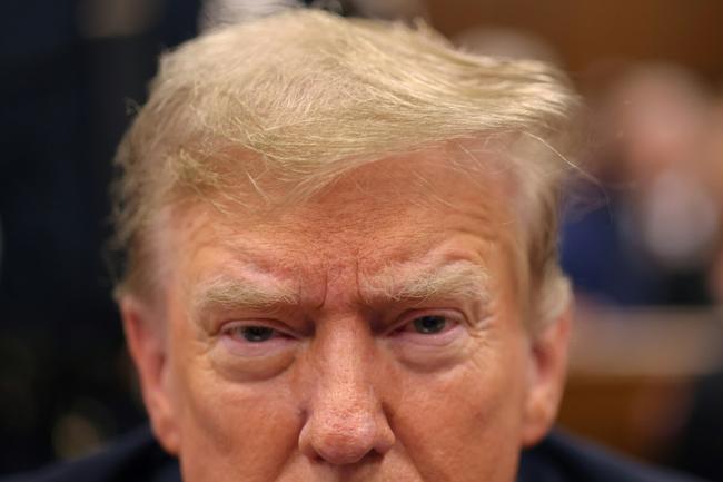 Former US President and Republican presidential candidate Donald Trump attends his trial for allegedly covering up hush money payments linked to extramarital affairs, at Manhattan Criminal Court in New York City, on May 21, 2024.  After approximately five weeks, 19 witnesses, reams of documents and a dash of salacious testimony, the prosecution against Donald Trump rested its case May 20, 2024, handing over to the defense before closing arguments expected next week.