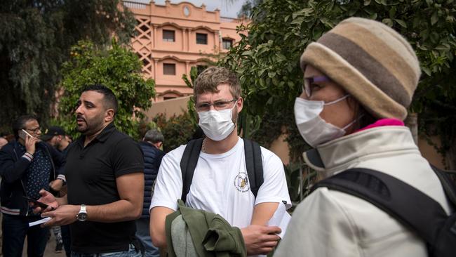 French tourists in Marrakech queue outside their consulate for help leaving Morocco. Picture:/ AFP.