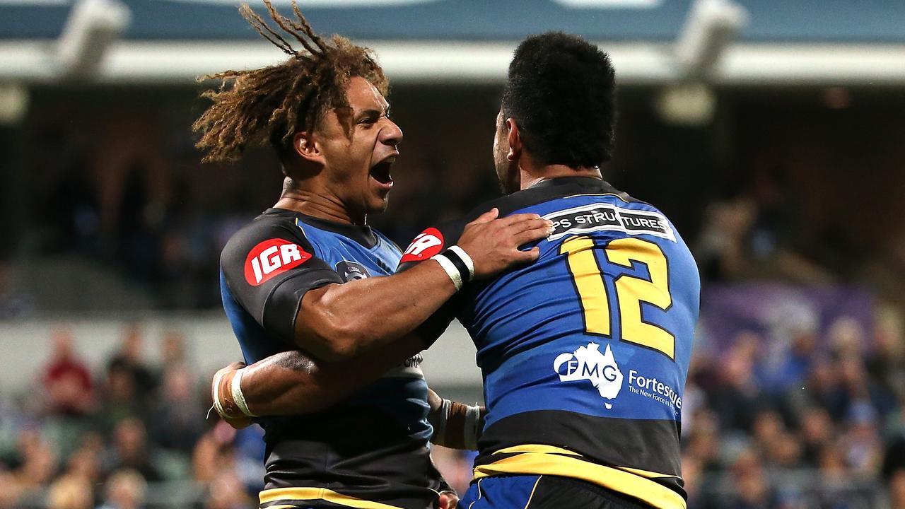 Issak Fines-Leleiwasa and Henry Taefu of the Force celebrate a try.