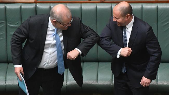 Morrison and Frydenberg celebrate the passing of the government’s wage subsidy package. Picture: Getty Images