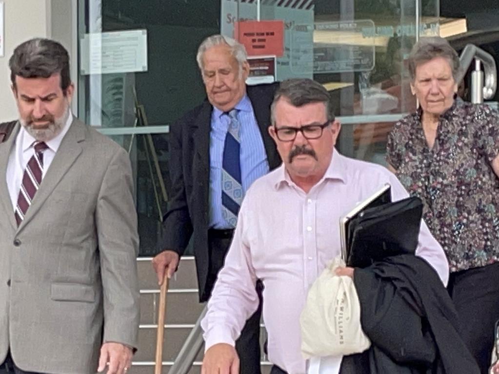 Rockhampton solicitor Brian McGowran with Kevin Leslie Baker, defence barrister Simon Lewis and Mr Baker's wife Geraldine, leaving Rockhampton courthouse after Mr Baker was fined $500 and no conviction recorded for one count of attempted indecent treatment of a boy under 14 at Neerkol Orphanage sometime between 1967 and 1971.