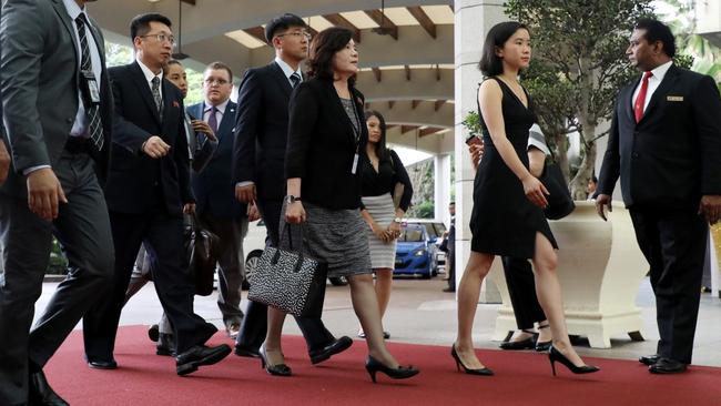 Choe Son-hui, centre, is an experienced diplomat known for heavy smoking and her ability to out-drink her male colleagues. She also likes expensive handbags. Picture: Bloomberg/Getty Images/The Times