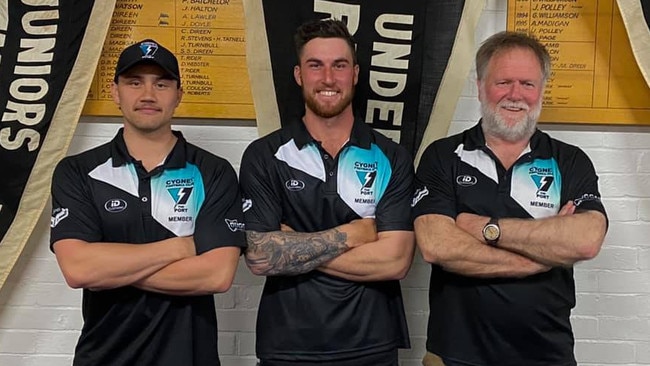 Ryan Wiggins (centre) pictured with playing coach Thor Boscott (left) and president David O’Neill in a signing announcement on Cygnet Football Club’s Facebook page.