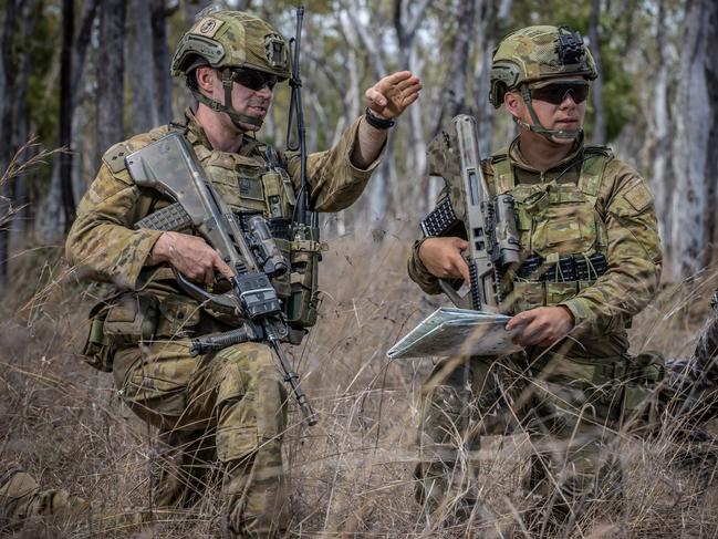 Australian Army Gap Year Officer Lieutenant Gabriel Sohn (right), from the 6th Battalion, Royal Australian Regiment, understudies Lieutenant Samuel Jenner at Shoalwater Bay Training Area, Queensland. Picture: Defence