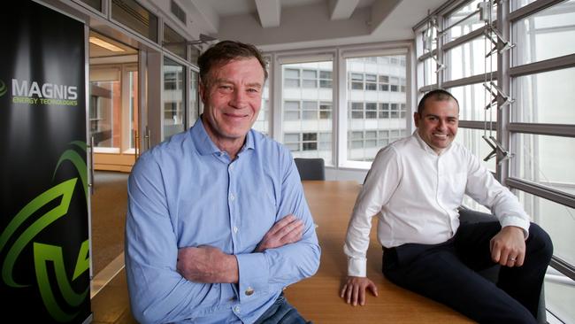 James Dack with Magnis Energy Technologies’ chairman Frank Poullas at the company’s head office in Aurora Place, Sydney. Picture: Liam Driver