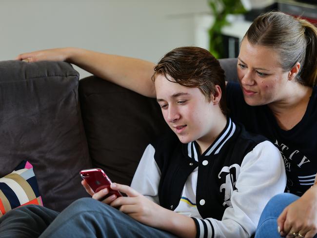 Mum Sarah Carpenter and son Michael Coleman playing on the mobile app Tiktok in Sydney December 28, 2019. Sunday Telegraph/ Gaye Gerard