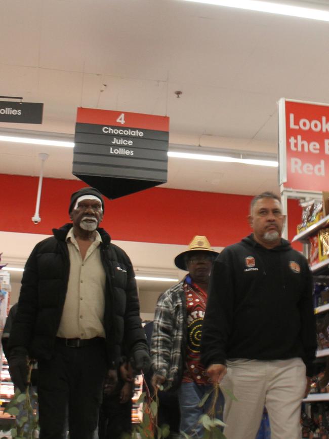 Robin Granites, the grandfather of a 24-year-old man from Yuendumu, walks through aisle four in Coles Alice Springs on Friday. Picture: Gera Kazakov