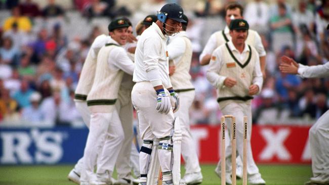 England's Mike Gatting (centre) was bowled out by Shane Warne's first delivery of the day at Old Trafford. Picture: PA Images