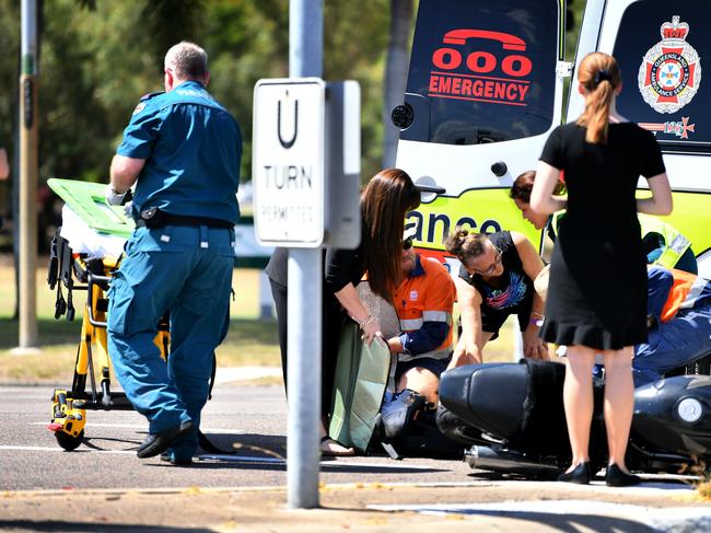 Emergency services respond to a two vehicle crash involving a four-wheel drive and a motorbike in Hermit Park. Picture: Alix Sweeney