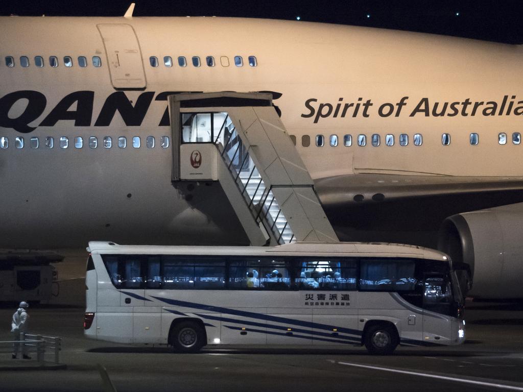 A bus carrying Australian passengers arrives at Haneda Airport in Tokyo. Picture: Tomohiro Ohsumi/Getty Images