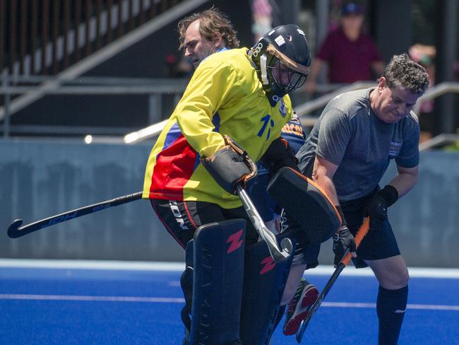 Action in the Pan Pacific Masters Games Hockey tournament. Picture: Glenn Campbell