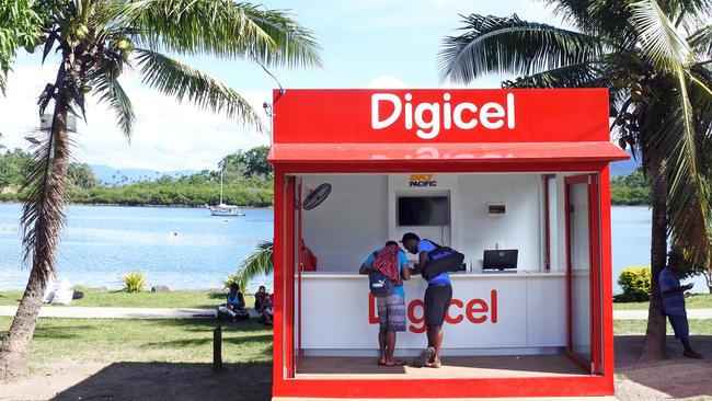 Customers at a Digicel store in Savusavu, Fiji.