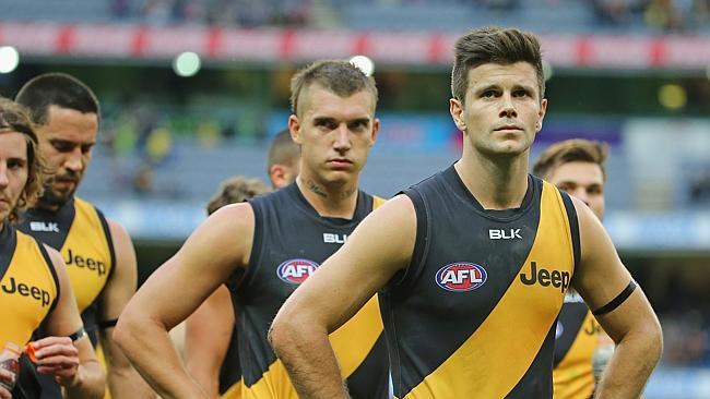 Trent Cotchin leads the Tigers off after Saturday’s disappointing loss to the Dees. Picture: Getty Images