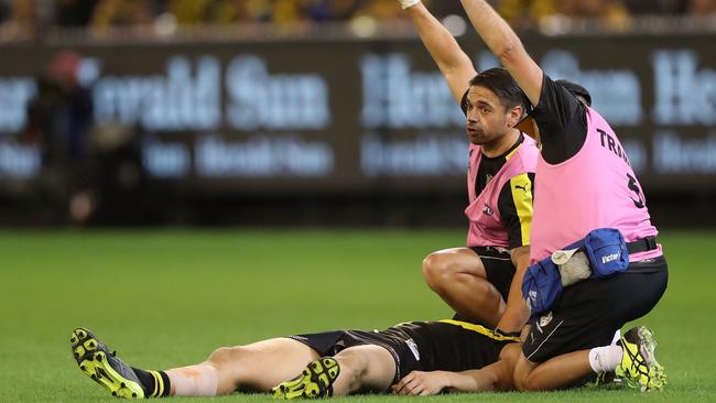 Trainers tend to Griffiths after a 2017 head knock. Picture: Getty Images