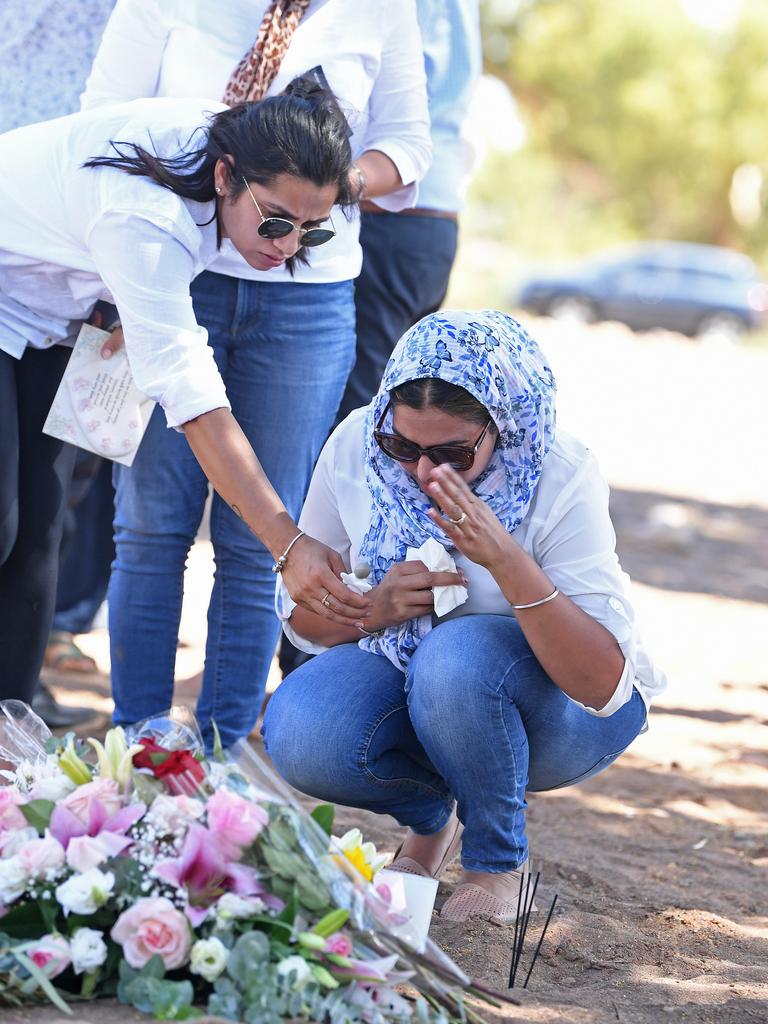 They laid flowers atop of the ‘shallow grave’ where her body was found. Picture: Tom Huntley