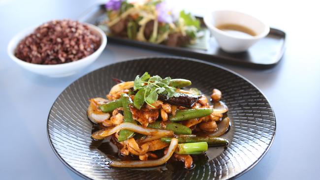 Wok chicken and cashew with rice and beef rib salad at Chon.