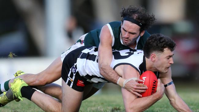 Echuca’s Mitch Kemp tackles Euroa’s Jacob Gleeson in the Goulburn Valley grand final replay.