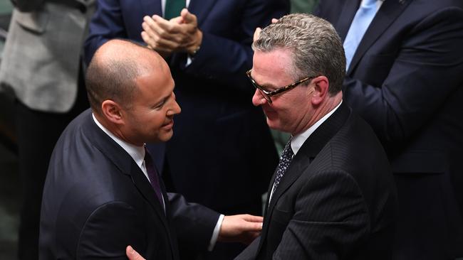 Treasurer Josh Frydenberg is congratulated by Christopher Pyne. Picture: Getty Images