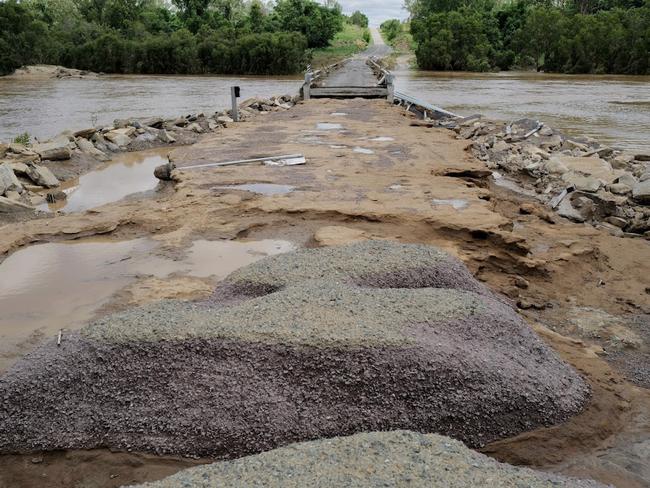 Ted Cunningham Bridge washed away in flood waters. Picture: Katrina Lezaic