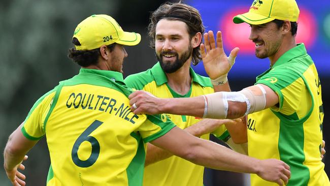 Kane Richardson, middle, in action for Australia during the World Cup. Picture: Saeed KHAN / AFP