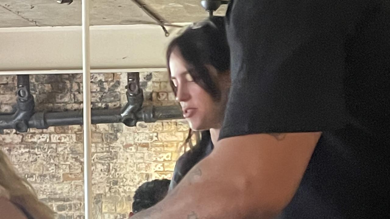 Billie Eilish mingles alongside unaware patrons at cafe