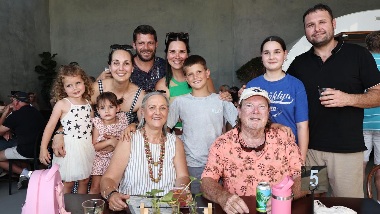 Charli Tier, 4, Makayla Williams, 2, Amy Williams, Anna-Marie Williams, Scot Tier, Alana Tier, Vander Tier, 9, Steve Williams, Hayley Williams, 13, and Dan Williams at the grand opening of Distil on the Hill's new Smithfield distillery. Picture: Brendan Radke