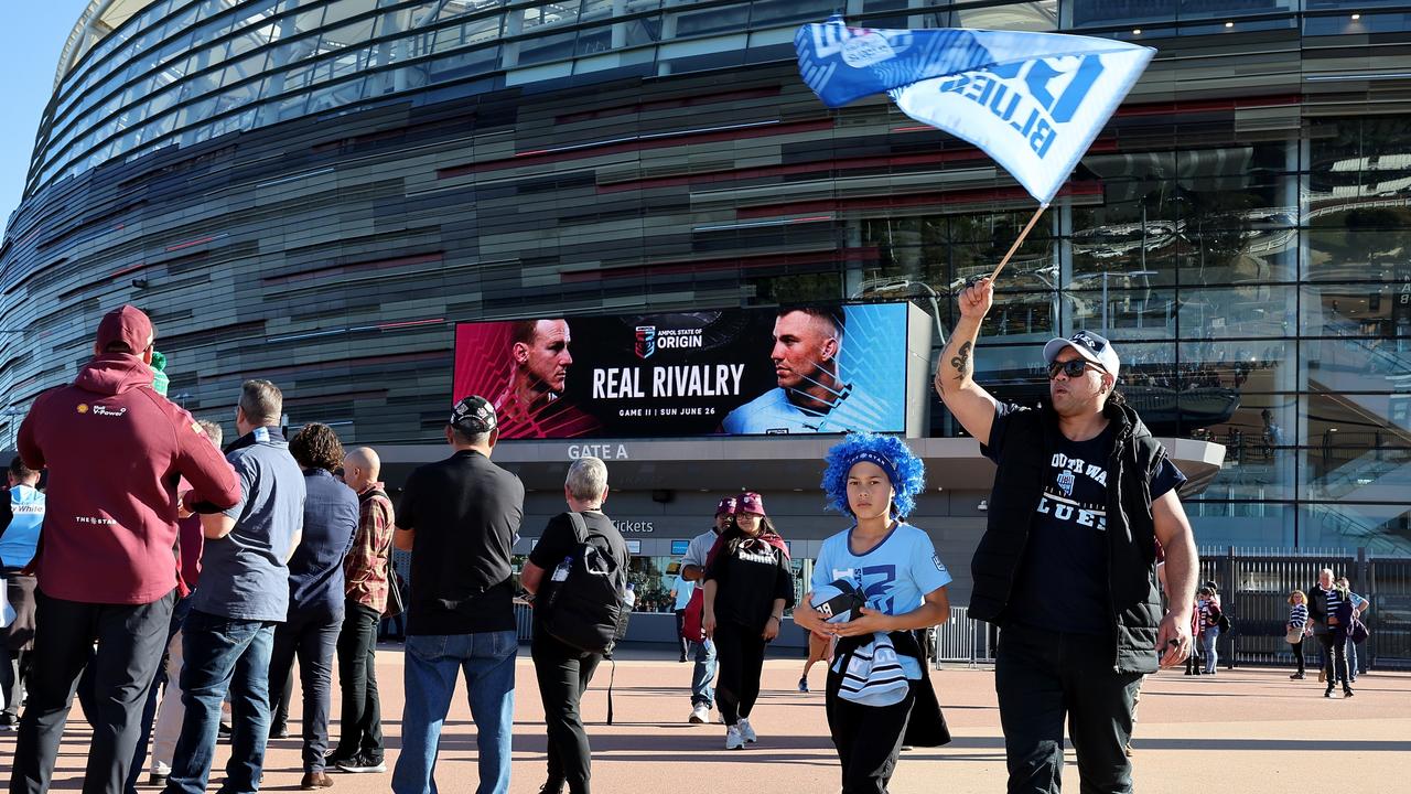 PERTH, AUSTRALIA - JUNE 26: Spectators arrive ahead of game two of the State of Origin series between New South Wales Blues and Queensland Maroons at Optus Stadium, on June 26, 2022, in Perth, Australia. (Photo by Paul Kane/Getty Images)