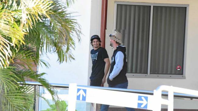 Tristan Webb with his mate walking out of Gympie Magistrate's Court on Tuesday after being convicted on animal neglect charges.