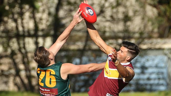 Kyle Galloway and Thomas Blake clash in the ruck. Picture: Hamish Blair