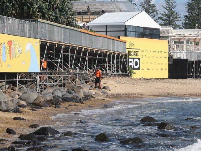 Workmen erecting grandstands for the Gold Coast Pro to be held at Burleigh Heads this weekend. Picture Glenn Hampson