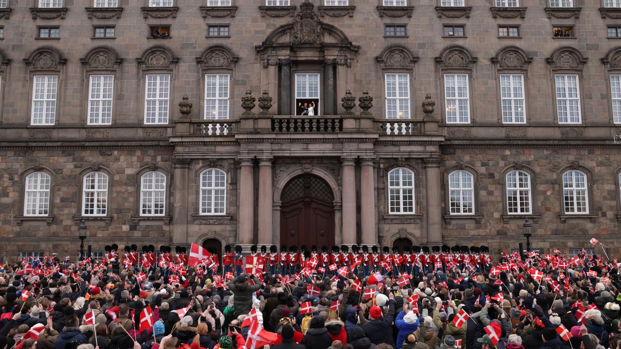 Danish King Frederik X and his wife Queen Mary of Denmark wave to the crowds after his proclamation by the Prime Minister, Mette Frederiksen on the balcony of Christiansborg Palace. Picture: Getty Images