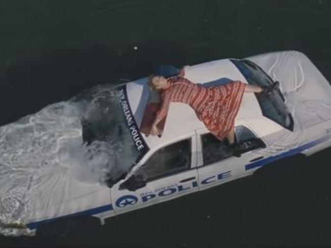 Beyonce on top of a sinking police car in New Orleans. Picture: YouTube