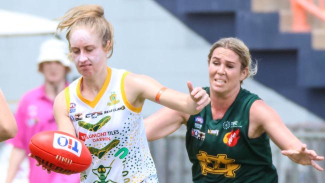 PINT's Steph Lawrence is chased down by St Mary's Jemma Iacono in the 2023-24 NTFL season. Picture: Celina Whan / AFLNT Media