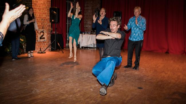 Russian to the dancefloor. Mikey Cahill doing Cossack Dancing in between DJing. Picture: Emma Buglisi