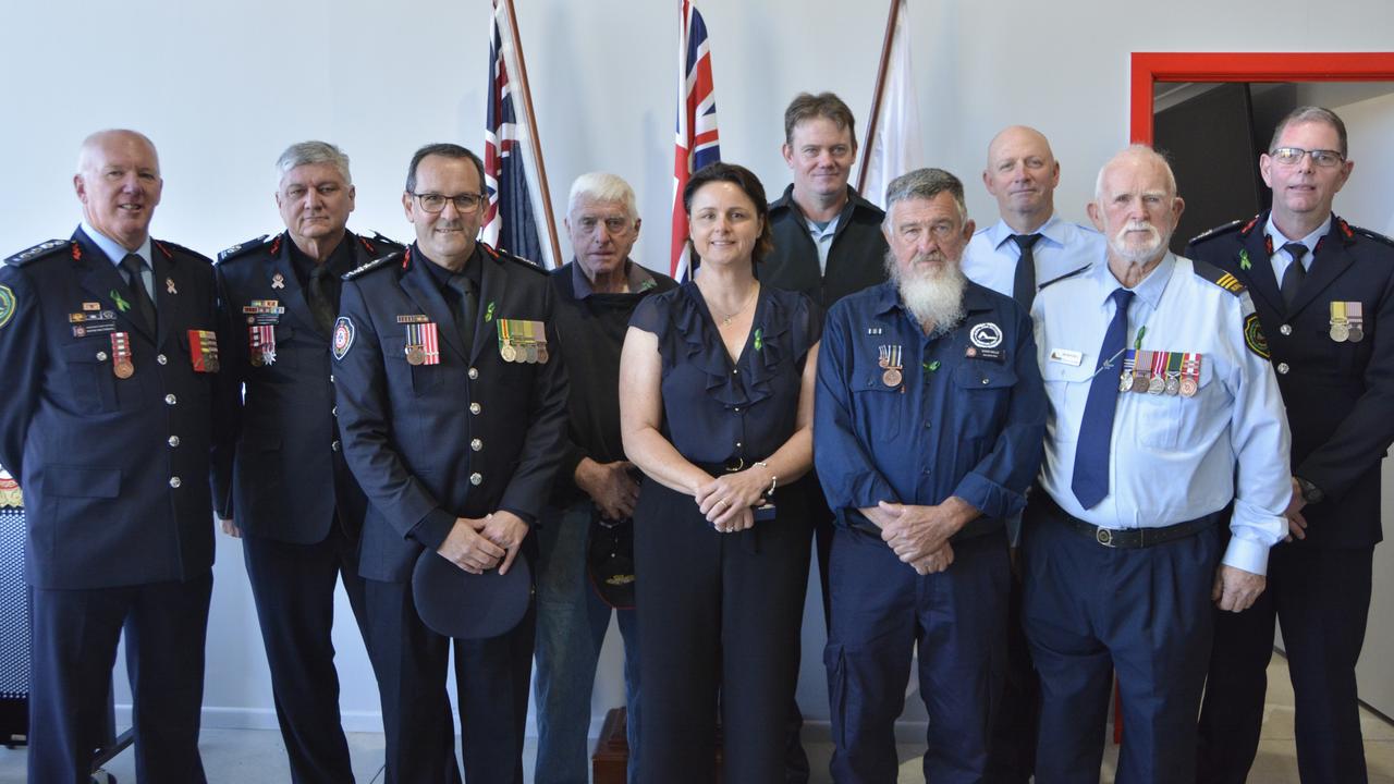 RFSQ Assistant Chief Officer Wayne Waltisbuhl, Fire and Rescue Assistant Commissioner David Hermann, QFD Commissioner Steve Smith with the award recipients during Rural Fire Service Week at Leslie Rural Fire Brigade on Saturday, August 3rd. Photo: Jessica Klein