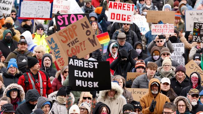 People protest against Donald Trump and Elon Musk outside the Michigan Capitol in Lansing, Michigan. Picture: AFP