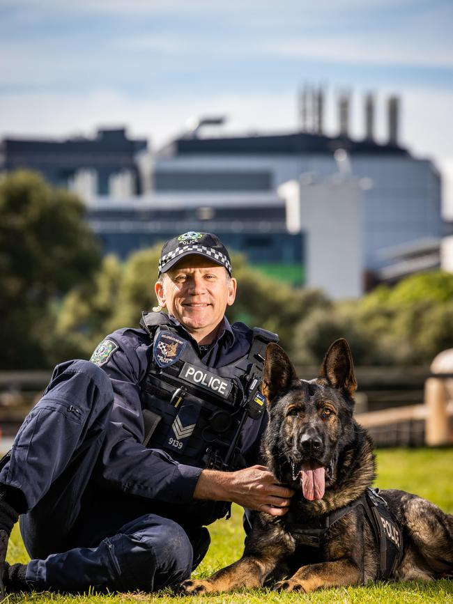 Dog handler Sargeant Simon Rosenhahn with PD Bomber. Picture: Tom Huntley