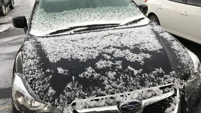 Hail covers a car at Angaston Primary School. Picture: Sam Lawrence