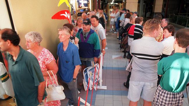 People queue outside a Parramatta Olympic merchandise store in Westfield waiting to by 550 "Days To Go" pin for Sydney 2000 Games on March 15, 1999. Picture: News Corp