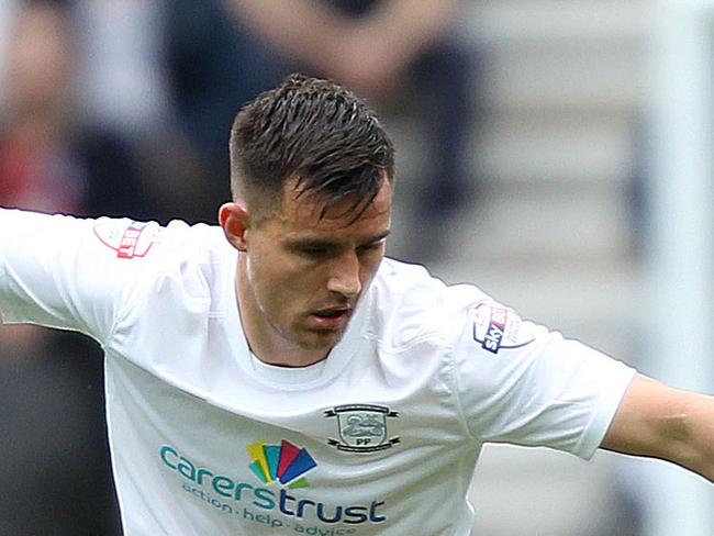 Preston North End's Bailey Wright and Rotherham United Alex Revell battle for the ball during the Sky Bet League One, Play-off Semi Final, First Leg at Deepdale, Preston.. Picture date: Saturday May 10, 2014. See PA story SOCCER Preston. Photo credit should read: Barrington Coombs/PA Wire.