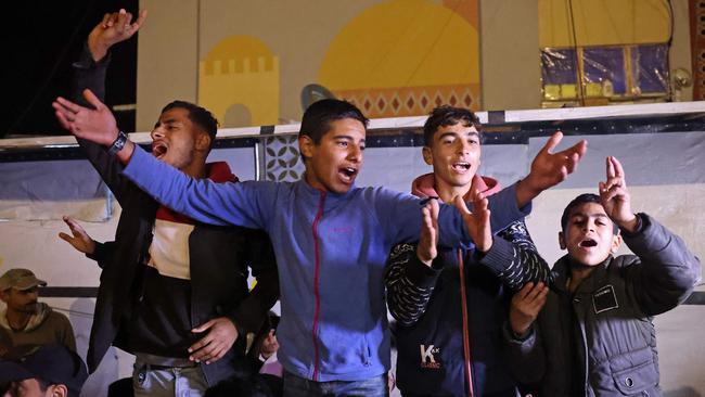 Palestinians in Khan Yunis in the southern Gaza Strip celebrate the truce. Picture: AFP