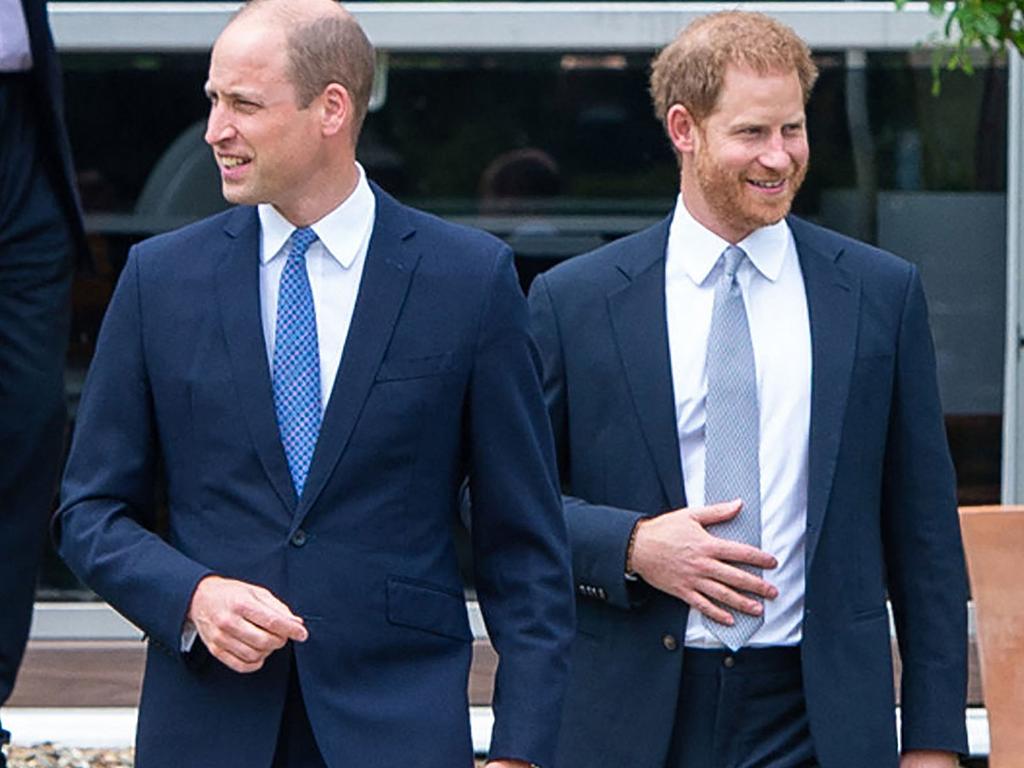 Britain's Prince William, Duke of Cambridge (L) and Britain's Prince Harry, Duke of Sussex arrive for the unveiling of a statue of their mother, Princess Diana at The Sunken Garden in Kensington Palace, London.