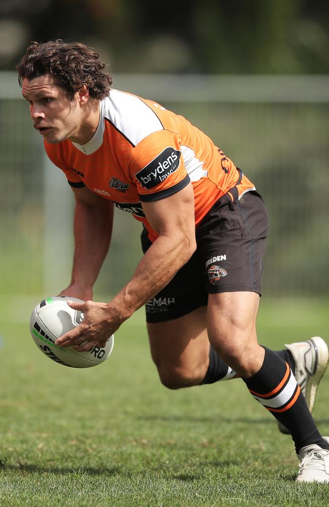 James Roberts runs with the ball during a Wests Tigers NRL training session. Photo: Matt King/Getty Images