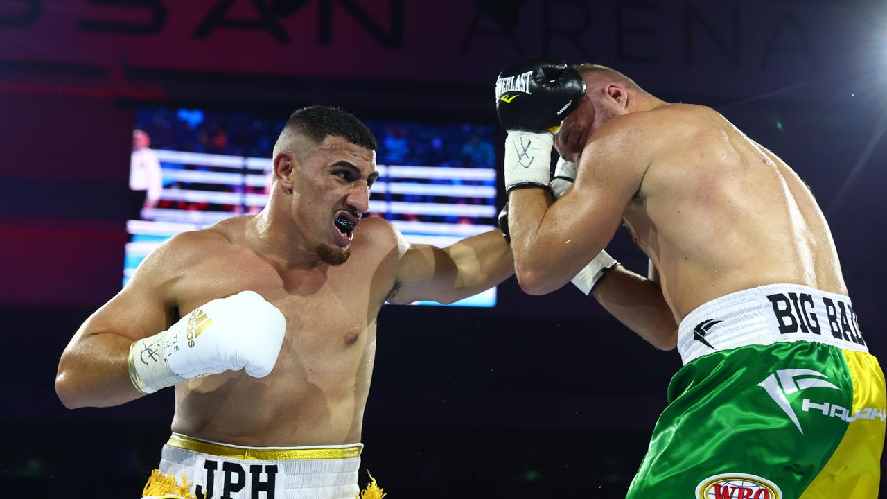 BRISBANE, AUSTRALIA - JUNE 15: Justis Huni punches Joe Goodall during the Heavyweight WBO Oriental &amp; IBF Pan-Pacific Regional title bout between Justis Huni and Joe Goodall at Nissan Arena on June 15, 2022 in Brisbane, Australia. (Photo by Chris Hyde/Getty Images)