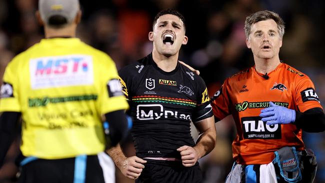 PENRITH, AUSTRALIA - AUGUST 15: Nathan Cleary of the Panthers reacts after taking a knock to his shoulder during the round 24 NRL match between Penrith Panthers and Melbourne Storm at BlueBet Stadium, on August 15, 2024, in Penrith, Australia. (Photo by Brendon Thorne/Getty Images)